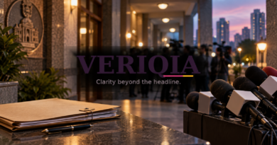 Neutral Thane civic setting and press microphones with centered VERIQIA watermark