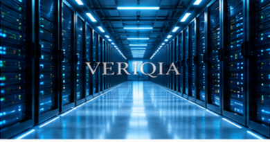 Illuminated rows of high technology server racks, colourful landscape editorial photograph with subtle centered VERIQIA watermark