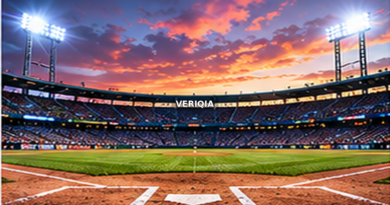 Baseball stadium at sunset during a packed evening game with centered VERIQIA watermark