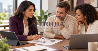 Financial planner discussing reports with clients, with a translucent VERIQIA watermark in the centre.